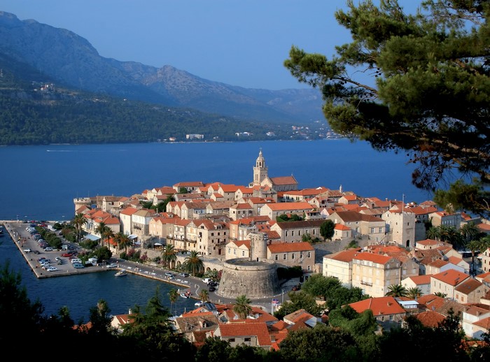Korcula, Croatia coastal town with mountains and sea
