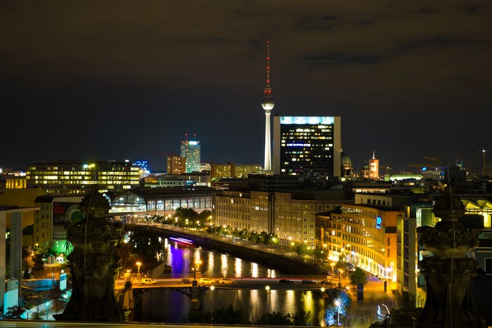 Berlin skyline at night with TV Tower and Spree River