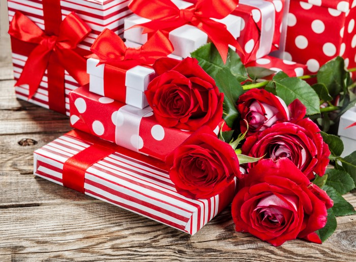 Red Roses and Gifts with Red Bows