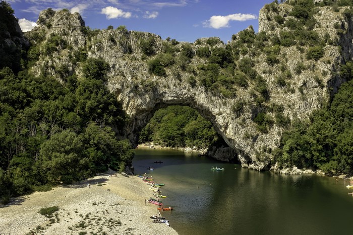 Vallon Pont d'Arc natural arch over river in France