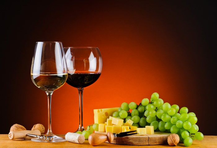 Wine, Grapes, Cheese, and Nuts with Stemware