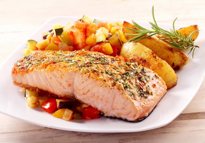 Salmon with roasted potatoes and vegetables