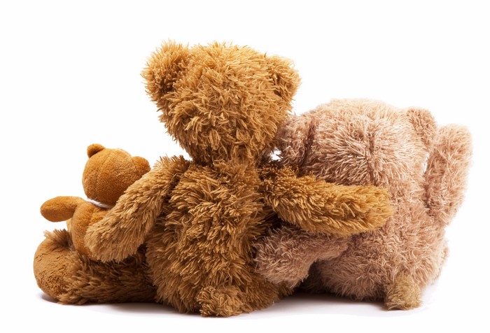 Three Teddy Bears Hugging