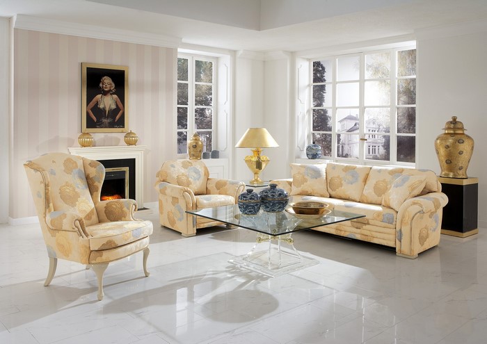 Living room with sofa, armchairs, and coffee table