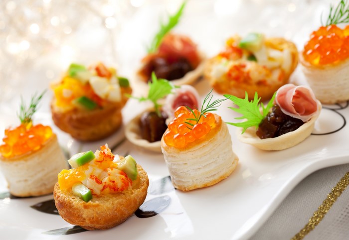 Assortment of seafood appetizers with caviar and shrimp