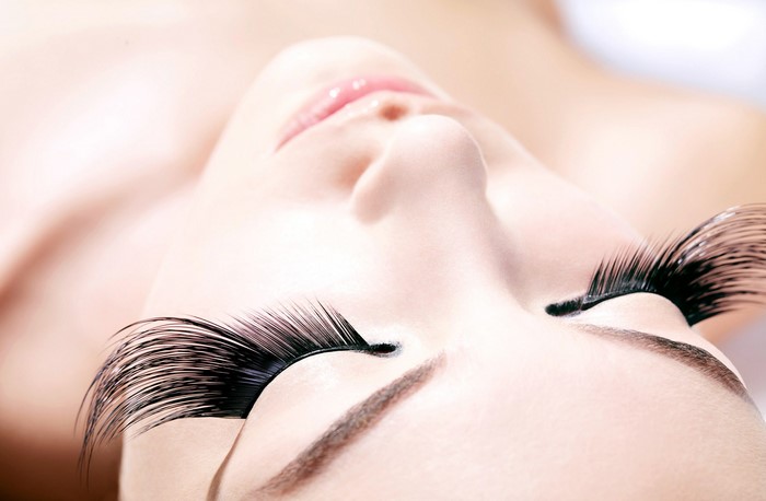 Woman with dramatic false eyelashes