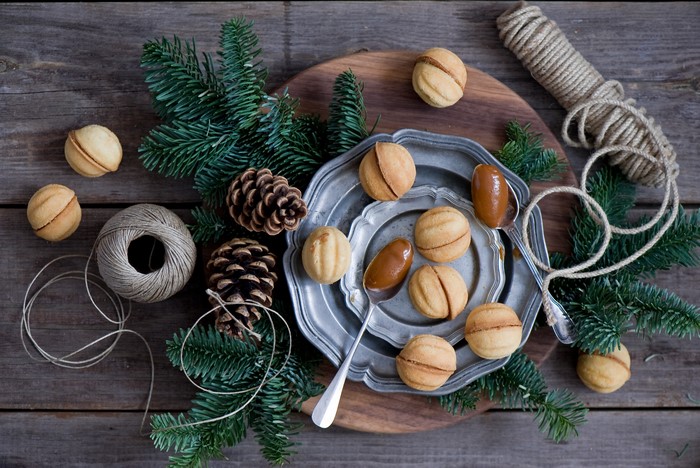 Christmas cookies with pine cones and fir branches