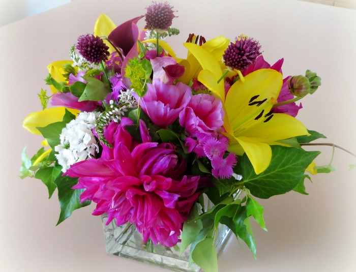 Colorful floral arrangement with dahlias and lilies