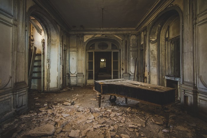 Abandoned room with a grand piano