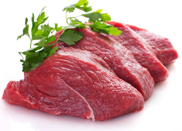 Raw meat with parsley garnish