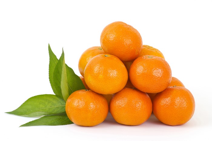 Pile of Mandarins with Leaves