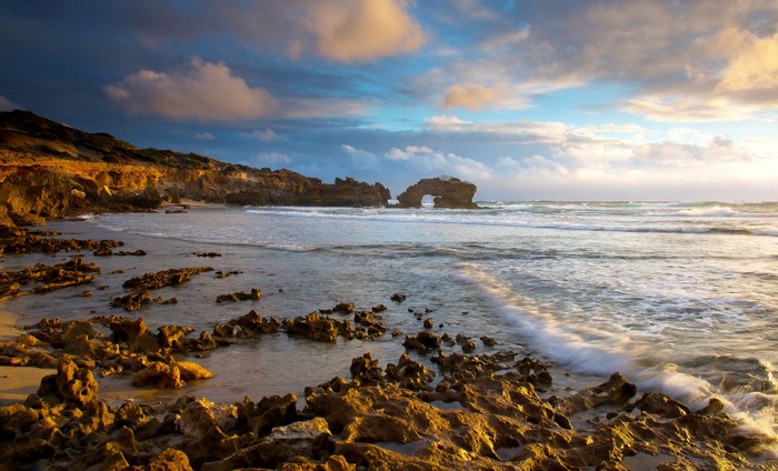 Rocky Coastline with Sea Arches at Sunset