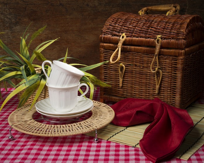 Still-life with cups and wicker basket