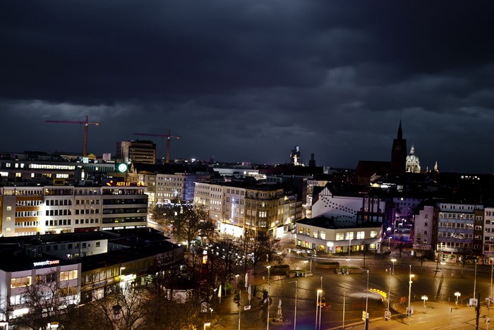 Hannover Germany Cityscape at Night with Cranes