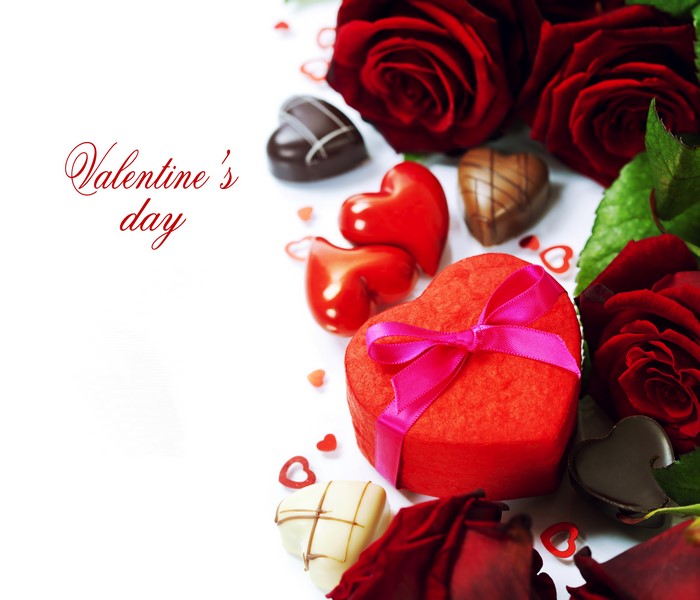 Valentine's Day roses, chocolates, and heart-shaped gift