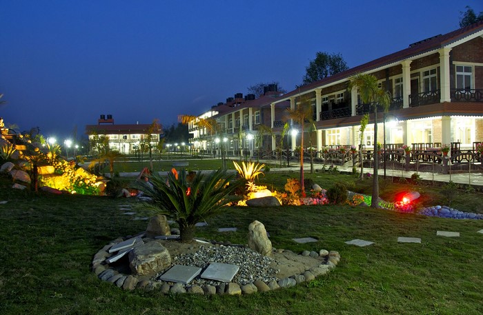 Resort buildings and garden at night in Sauraha, Nepal