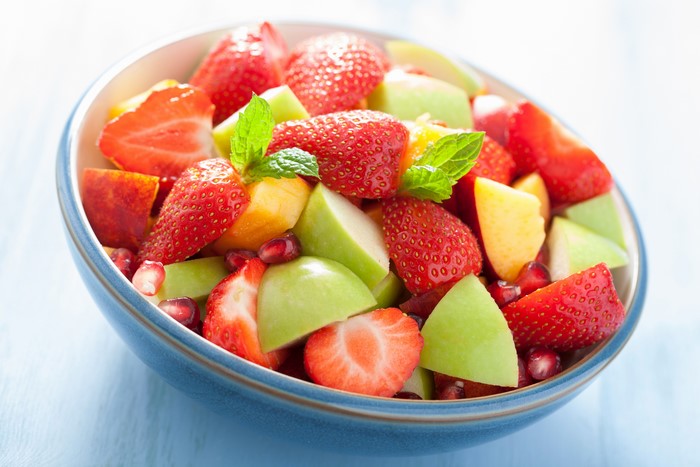 Fruit salad with strawberries and apples