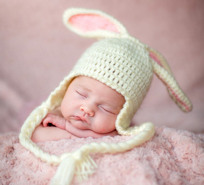 Baby wearing a bunny hat