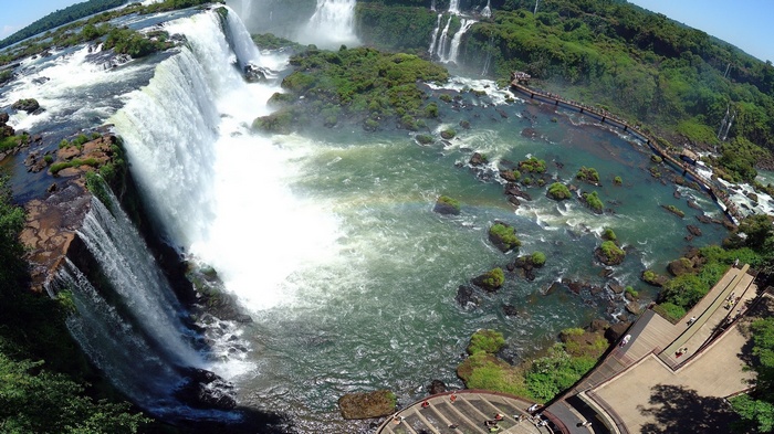 Iguazu Falls with walkways and lush greenery