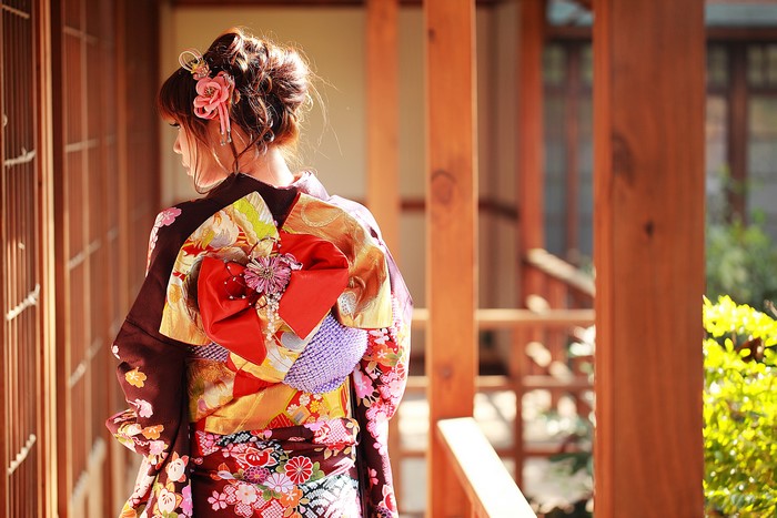 Woman in Kimono with Flower Hair Accessory