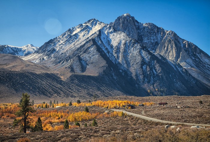 Mountains and Autumn Foliage with a Road