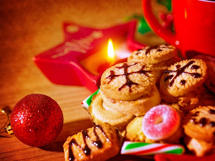 Christmas cookies with red mug and candle