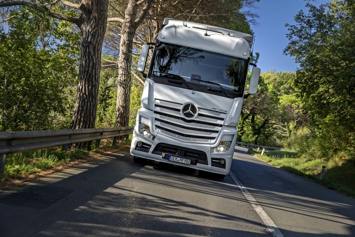 White Mercedes-Benz Actros Truck on a Road