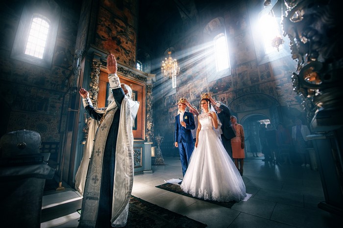 Orthodox wedding ceremony with bride and groom