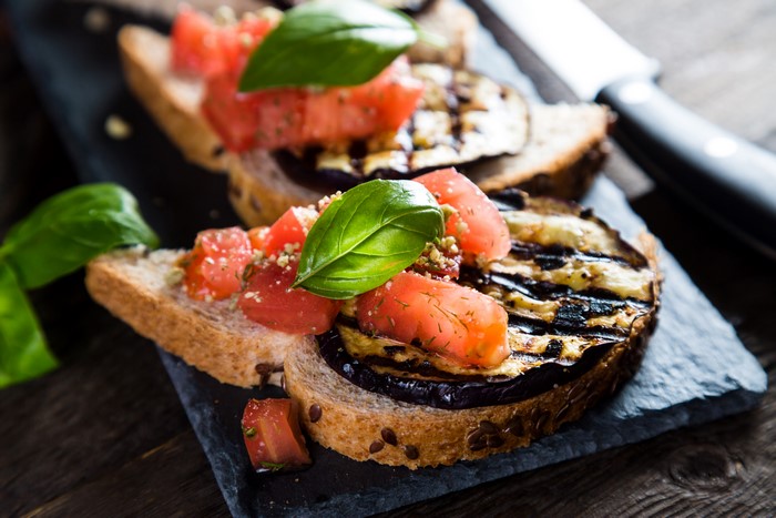 Bruschetta with grilled eggplant and tomatoes