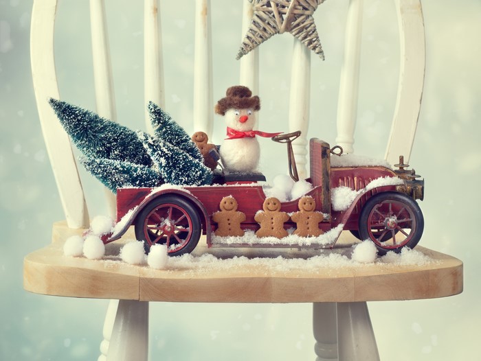 Christmas toy truck with snowman and trees