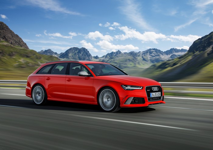 Red Audi RS 6 Avant on a Mountain Road