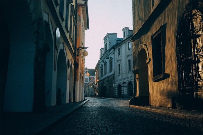 Cobblestone street with old buildings
