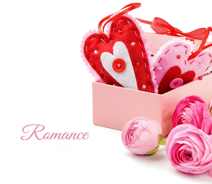 Valentine's Day hearts in a pink box with ranunculus flowers