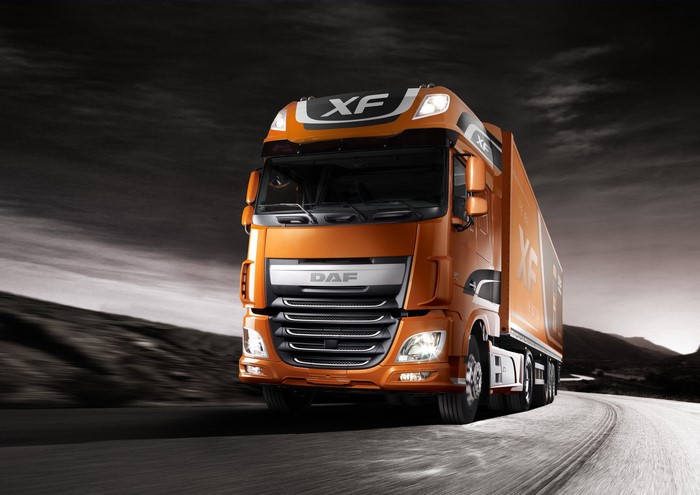 Orange DAF XF Euro 6 Truck in Motion