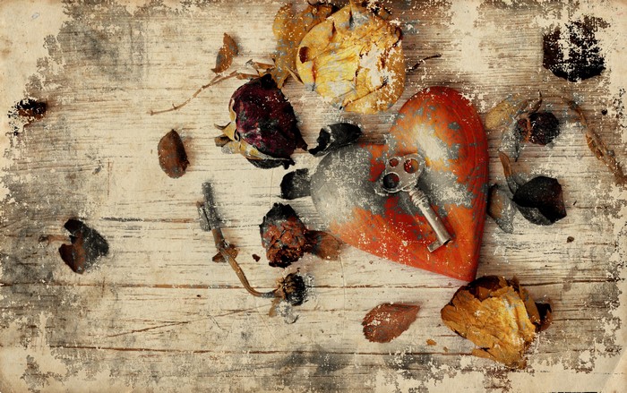 Heart with key and dried foliage