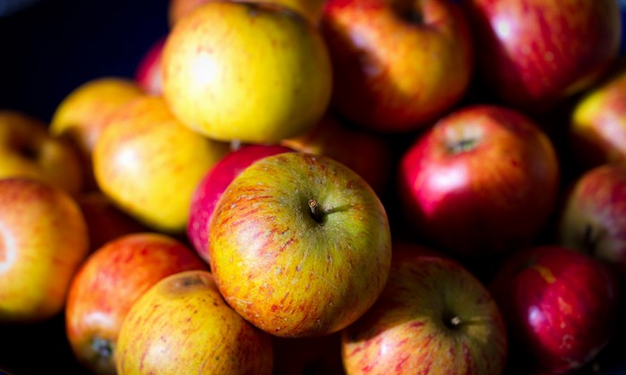 Close-up of a pile of ripe apples