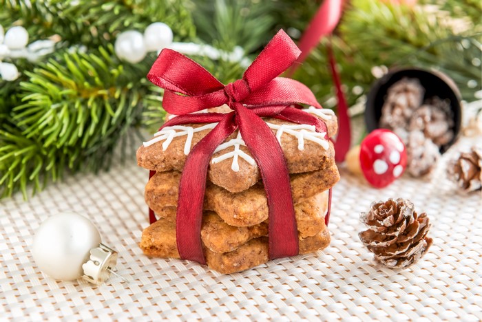 Christmas cookies tied with a red ribbon