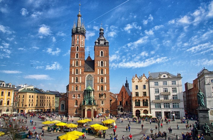 St. Mary's Basilica in Krakow Town Square with People