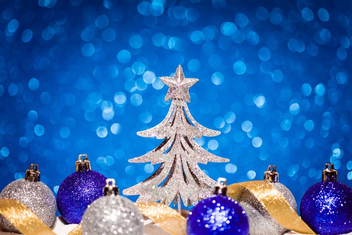 Christmas Tree and Ornaments with Blue Bokeh Background
