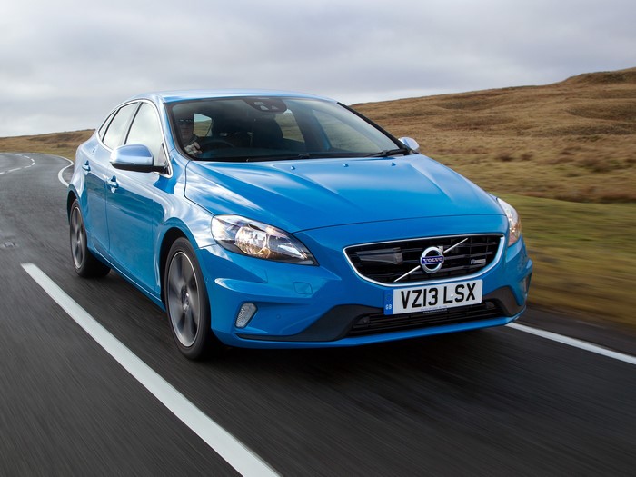Blue Volvo V40 R-Design driving on a road