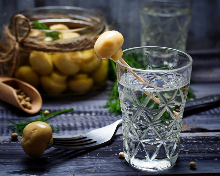 Vodka with pickled mushrooms and dill