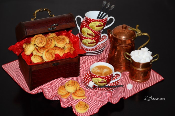 Still-life with pastries, coffee, and sugar cubes