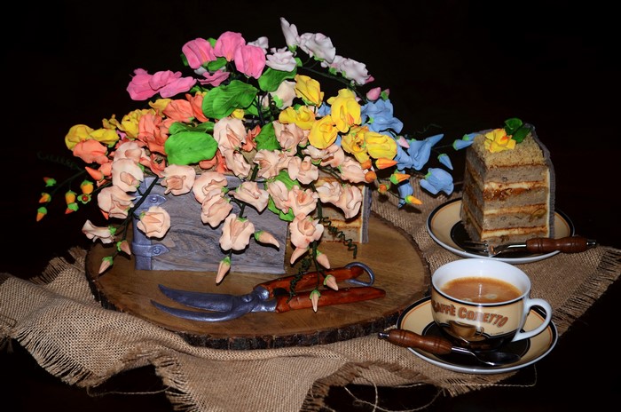 Cake with flowers and coffee