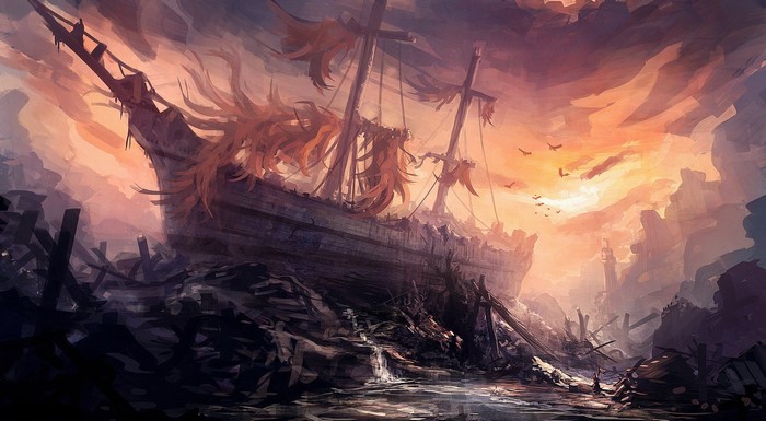 Shipwrecked ship in a desolate landscape at sunset