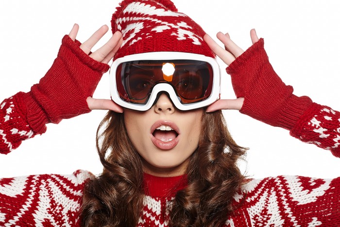 Woman in winter hat and goggles