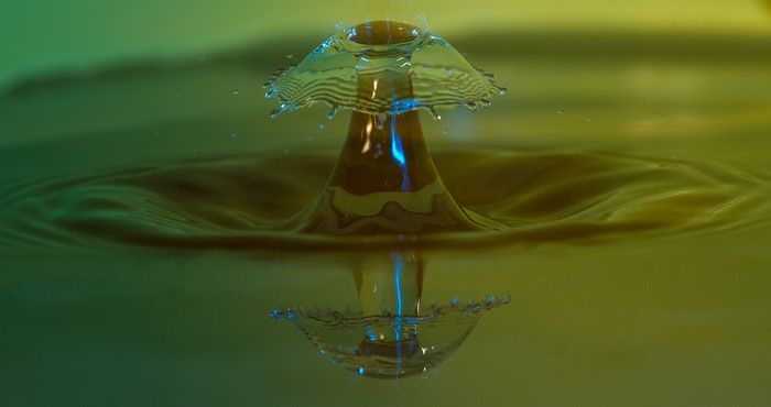 Water drop collision macro shot