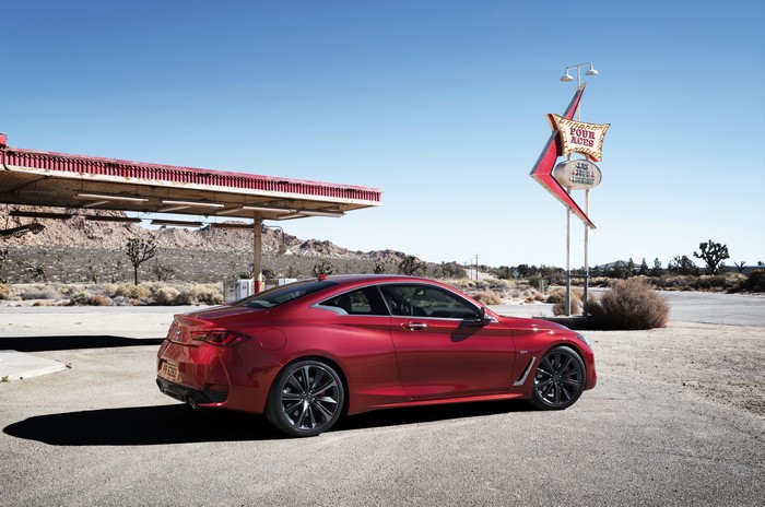 2016 Infiniti Q60 coupe at a desert gas station