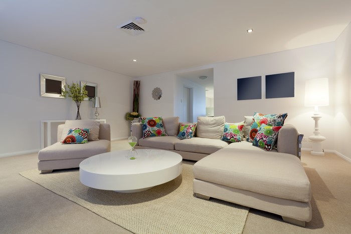 Living room with sofa, armchair, and coffee table