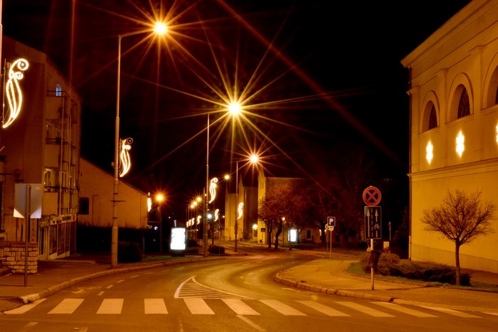 Street lights and buildings at night in Varpalota, Hungary