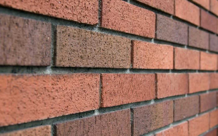 Closeup of a red brick wall texture